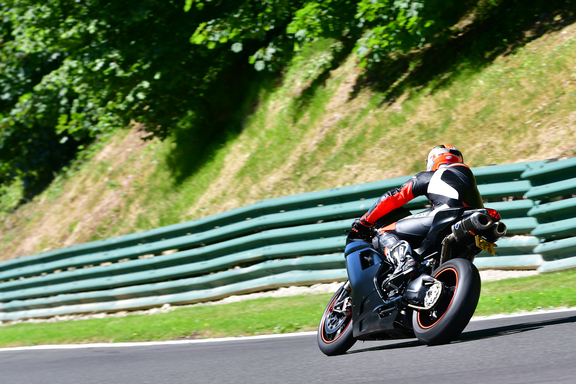 Sportbike leaned through a corner at Cadwell Park